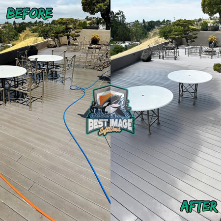 Technician performing wood safe deck washing in fairfield ca